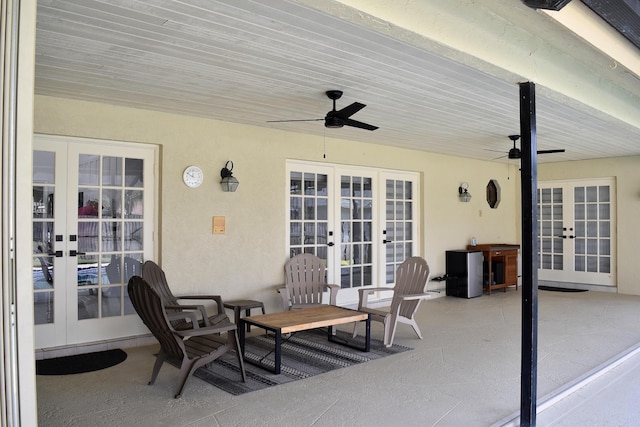 view of patio / terrace featuring ceiling fan and french doors