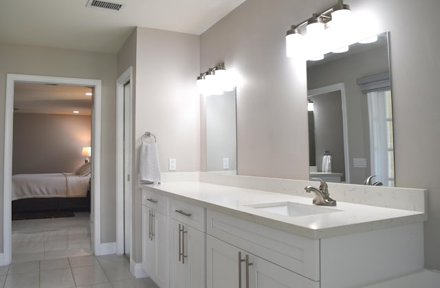 bathroom featuring vanity and tile patterned floors