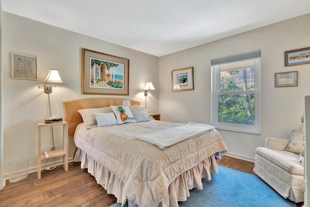 bedroom featuring wood-type flooring