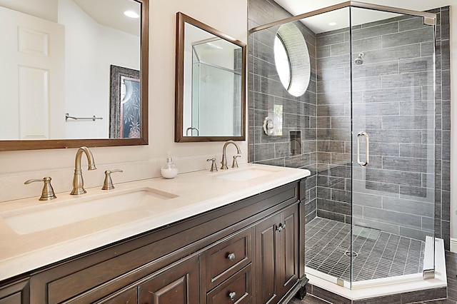 bathroom with vanity and walk in shower