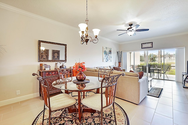 dining room featuring crown molding and light tile patterned floors