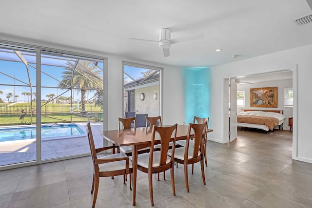 dining space featuring ceiling fan