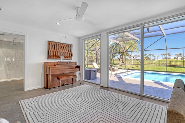 bedroom with tile patterned flooring, access to exterior, and ensuite bathroom