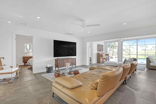 living room with ceiling fan