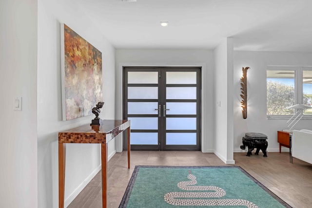 foyer entrance featuring french doors