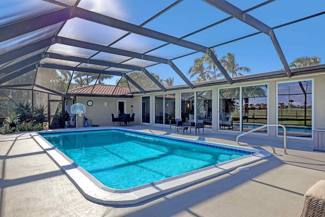 view of pool featuring a lanai and a patio