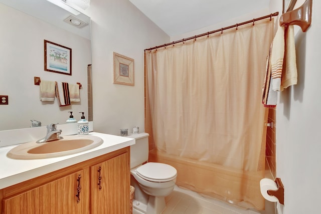 full bathroom with vanity, shower / tub combo with curtain, and toilet