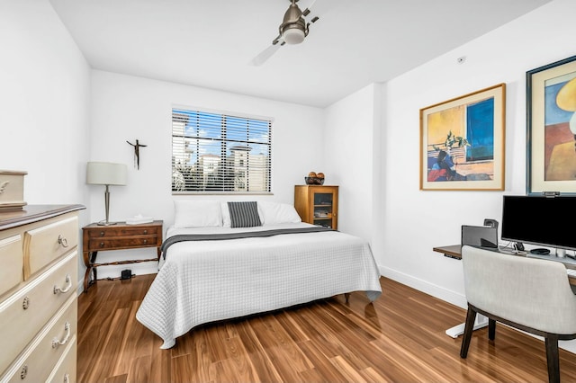 bedroom featuring hardwood / wood-style flooring and ceiling fan