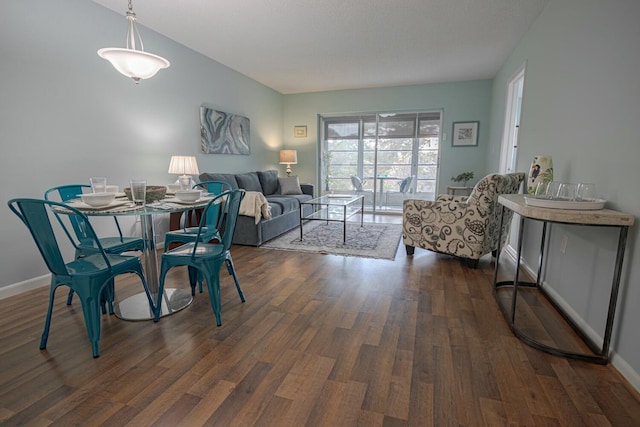 living room featuring dark wood-type flooring