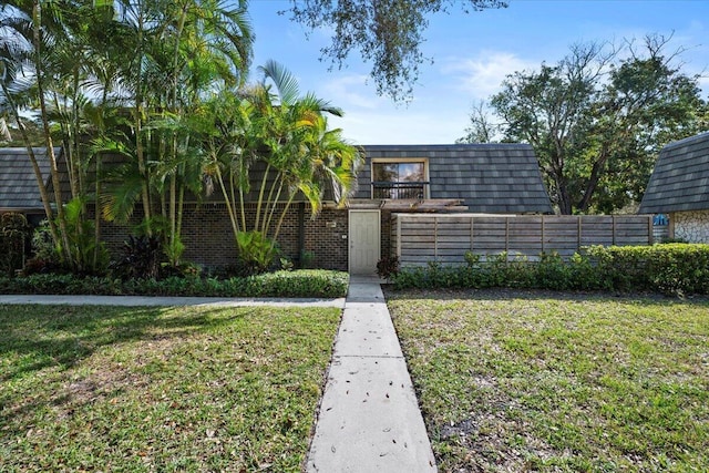 view of front of property with a front lawn