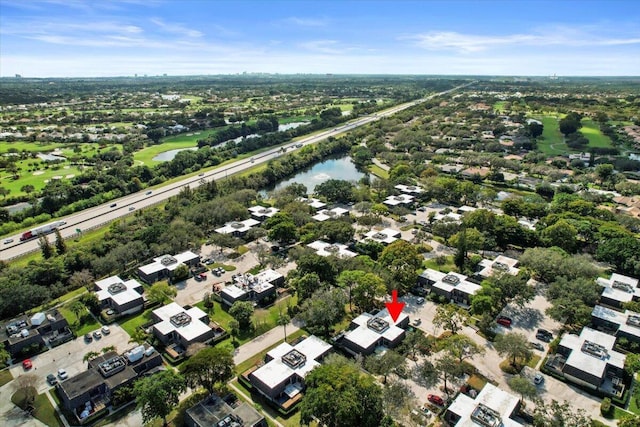 bird's eye view with a water view