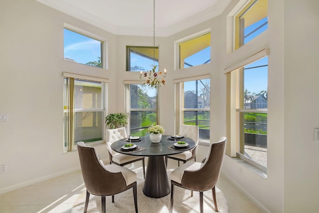 sunroom featuring a notable chandelier