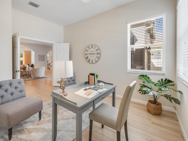 office area with light hardwood / wood-style flooring