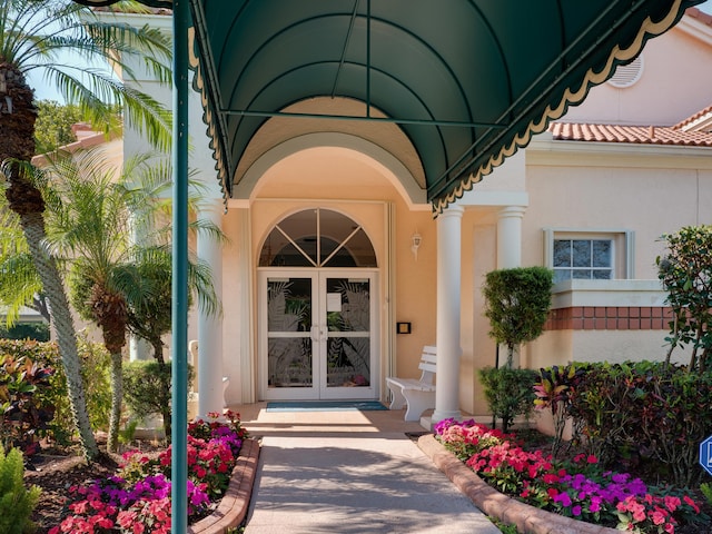 view of exterior entry with french doors