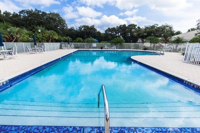 view of pool featuring a patio area