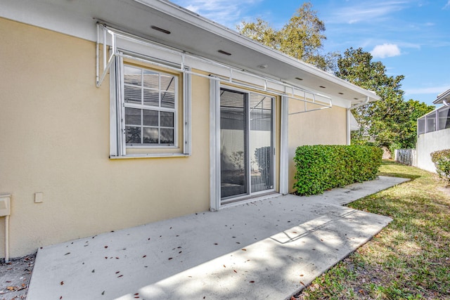 back of property with a patio