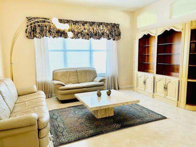 living room with light tile patterned floors