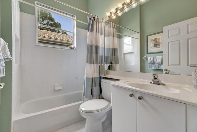 full bathroom with tile patterned flooring, shower / tub combo, vanity, and toilet