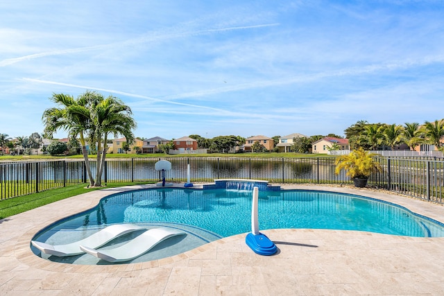 view of pool with a water view, pool water feature, and a patio area