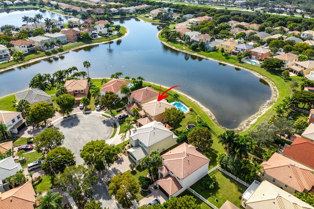 drone / aerial view with a water view