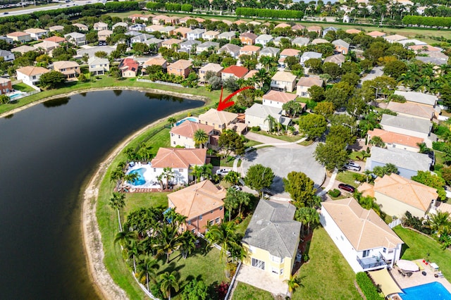 drone / aerial view featuring a water view