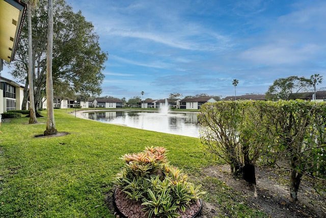 view of yard with a water view