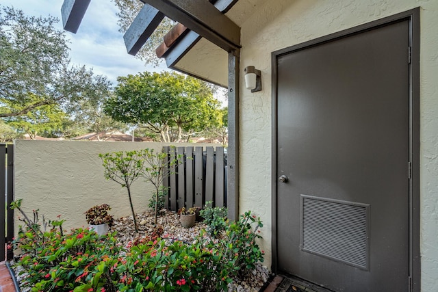 property entrance with a balcony