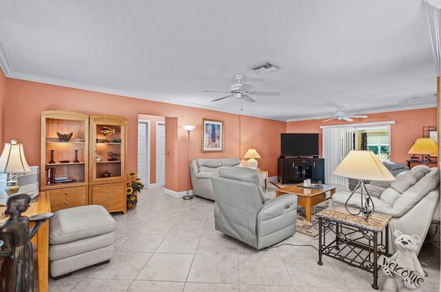 tiled living room with ornamental molding and ceiling fan