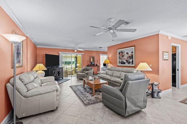 living room featuring light tile patterned floors, ornamental molding, a textured ceiling, and ceiling fan