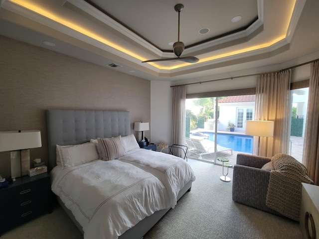 bedroom featuring crown molding, ceiling fan, carpet floors, access to outside, and a raised ceiling