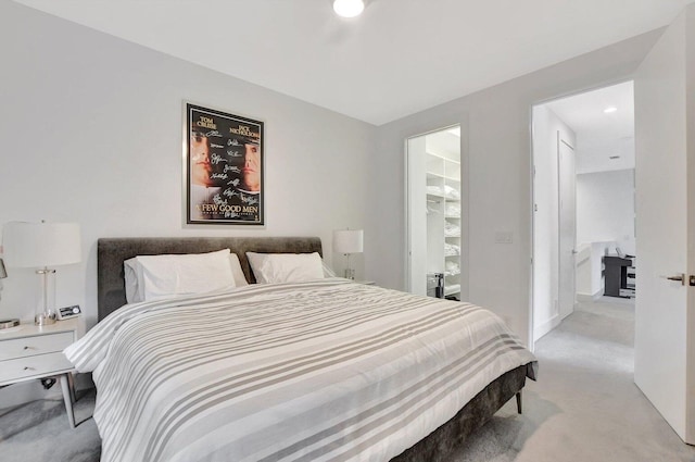 bedroom featuring light carpet