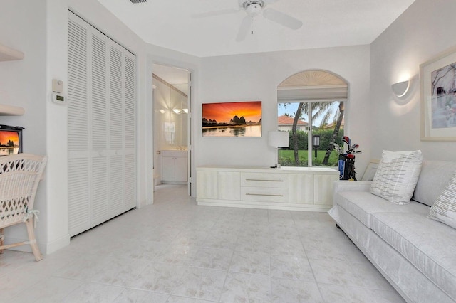 living room with ceiling fan