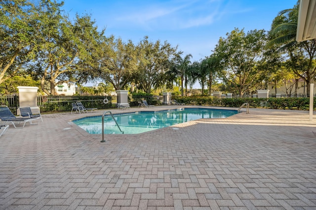 view of pool featuring a patio area