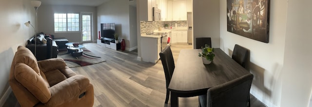 dining area featuring light hardwood / wood-style flooring