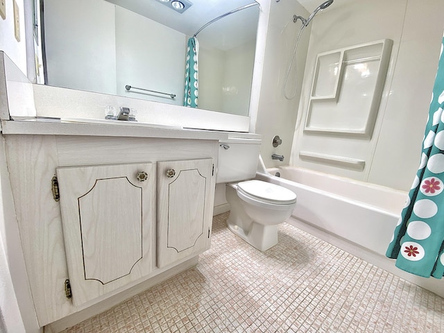 full bathroom featuring vanity, shower / tub combo with curtain, and toilet