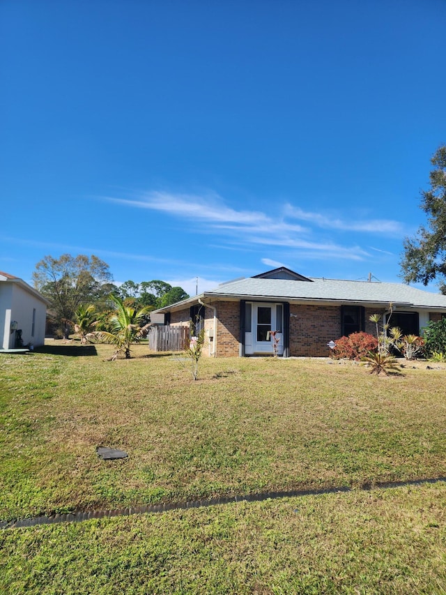 exterior space with a front lawn