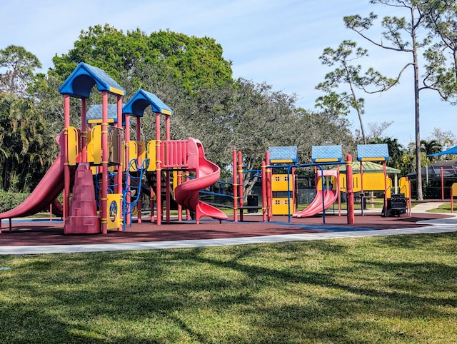 view of playground with a yard