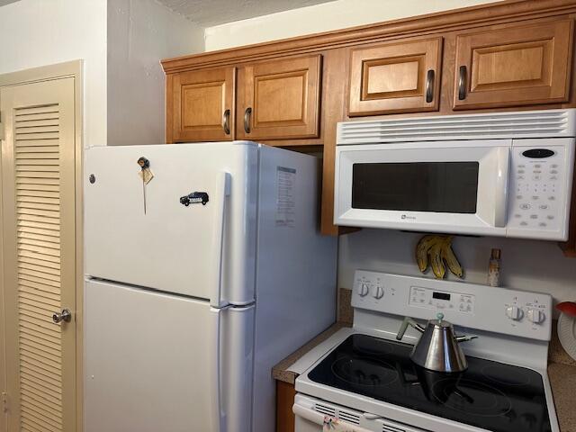 kitchen featuring white appliances