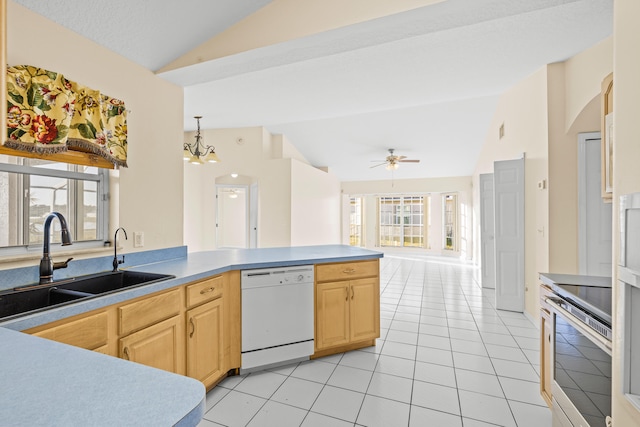 kitchen with vaulted ceiling, light brown cabinetry, sink, electric range, and white dishwasher