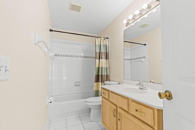 full bathroom featuring vanity, toilet, tile patterned flooring, and shower / bath combo