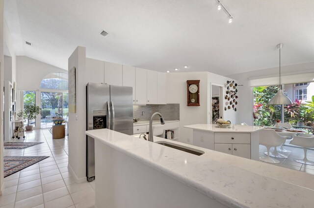 kitchen featuring sink, ceiling fan, white cabinets, and appliances with stainless steel finishes