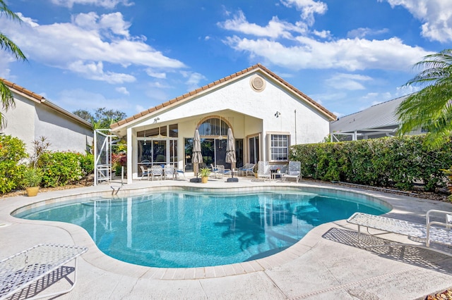 view of pool featuring a patio area