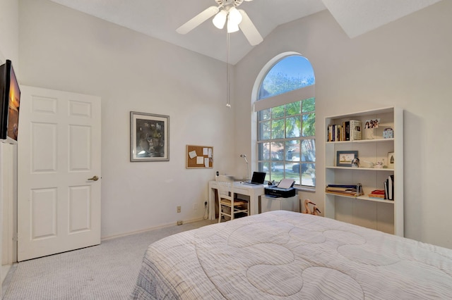 bedroom with high vaulted ceiling, light colored carpet, and ceiling fan