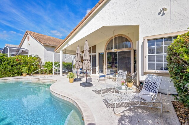 view of pool featuring a patio area