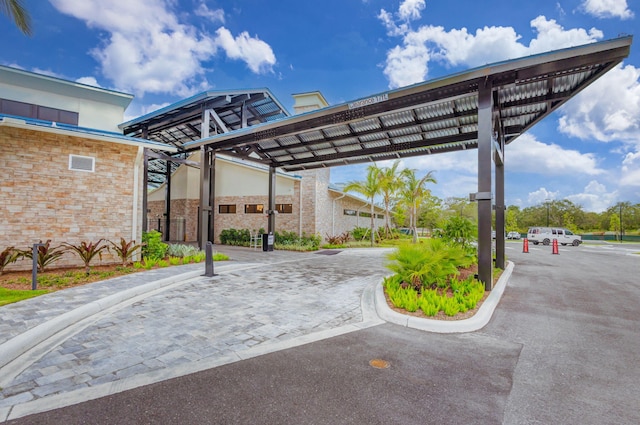 view of parking featuring a carport