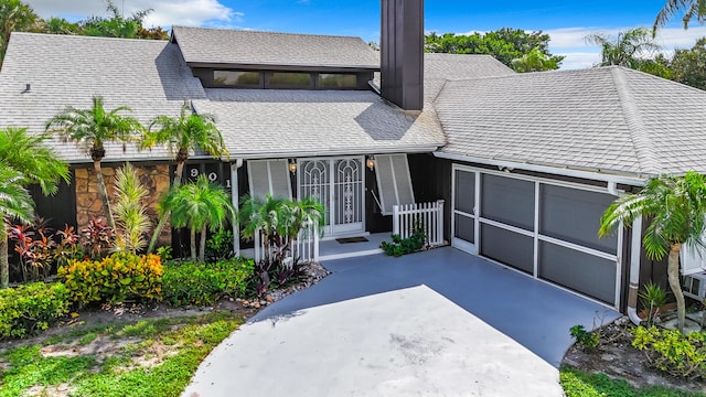 view of front of property with a garage