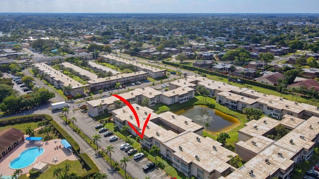 birds eye view of property featuring a water view