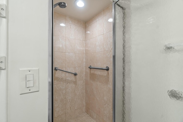 bathroom featuring an enclosed shower