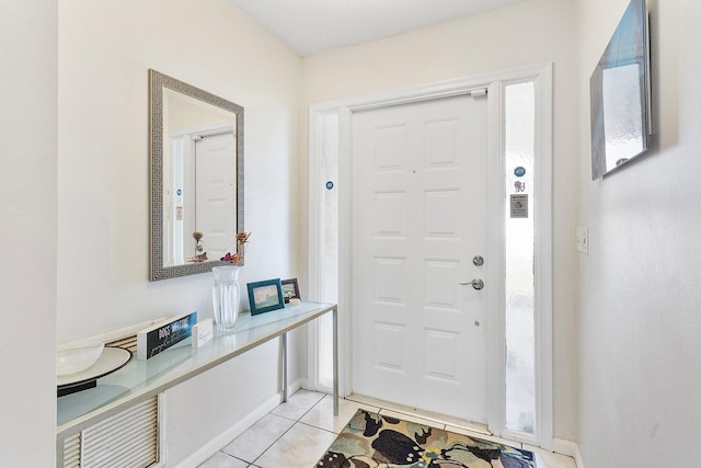 entryway featuring light tile patterned floors