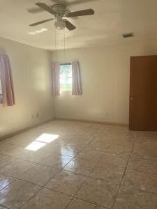 empty room with ceiling fan